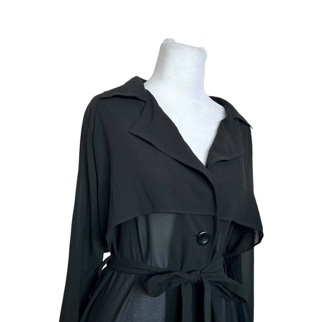 Elegant black sheer trench.