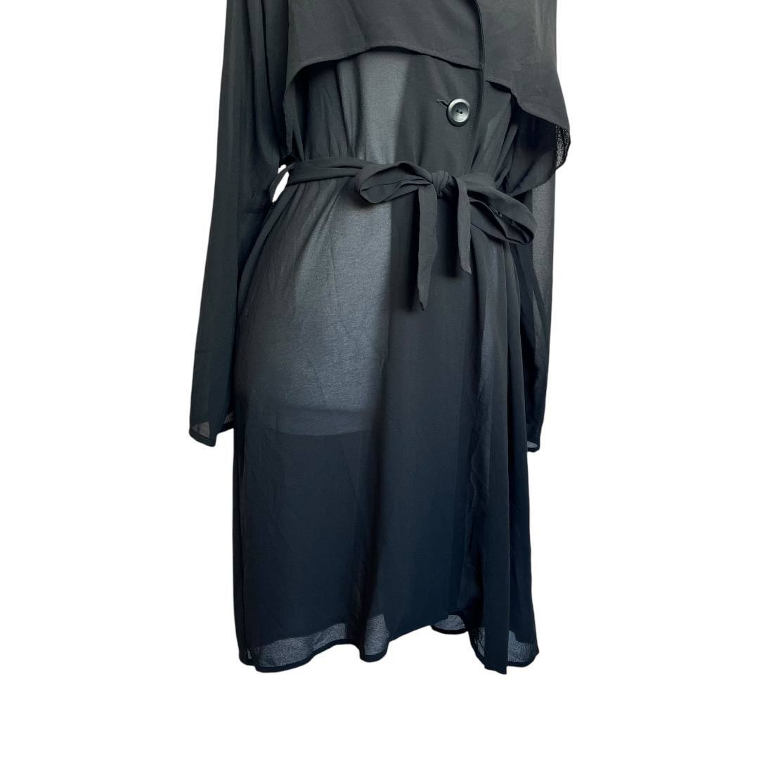Elegant black sheer trench.